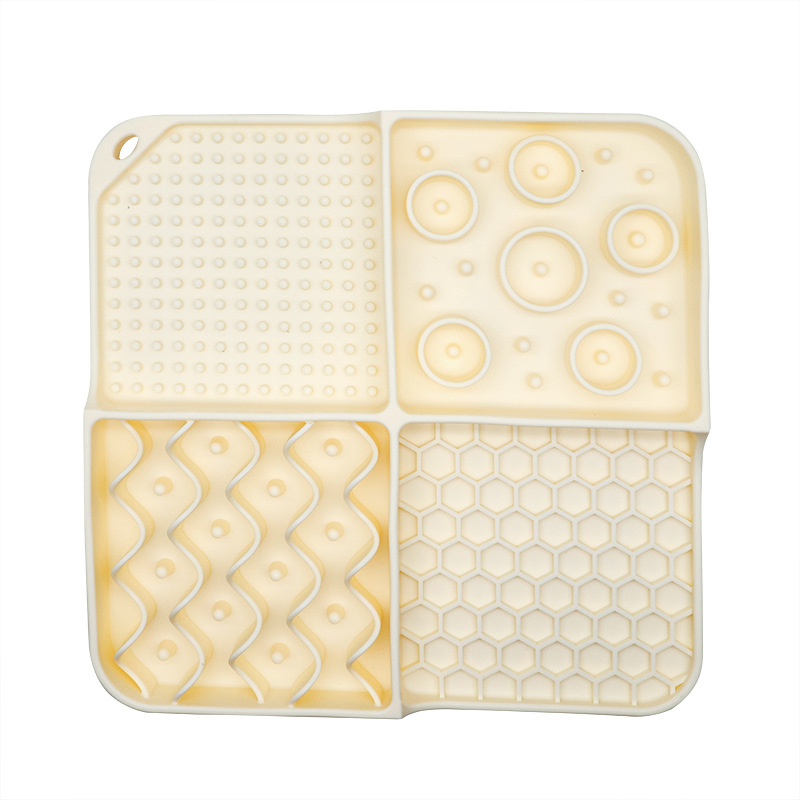 PAXA Calm Mat top surface — four lick-zone textures